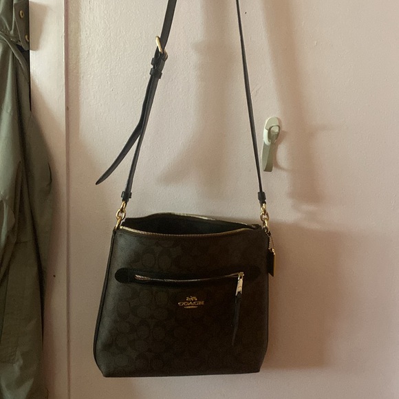 This is a brown and black coach satchel - Picture 7 of 7